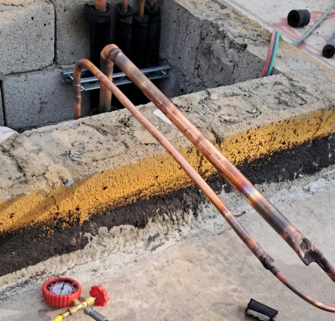 Copper refrigerant pipes prepared for HVAC project work